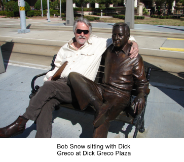 Bob Snow sitting with Dick Greco at Dick Greco Plaza
